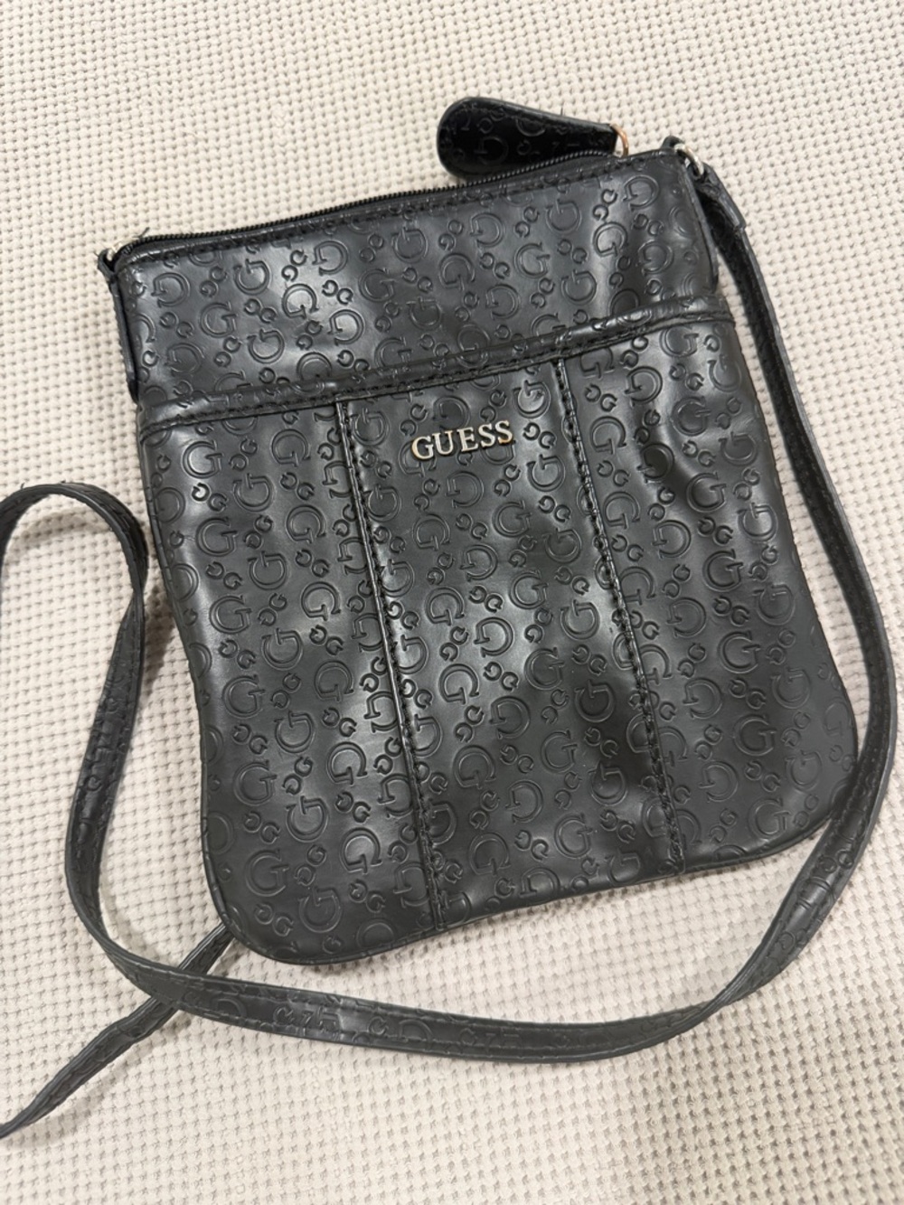 GUESS Black Embossed Logo Crossbody Bag with Gold Tone Hardware